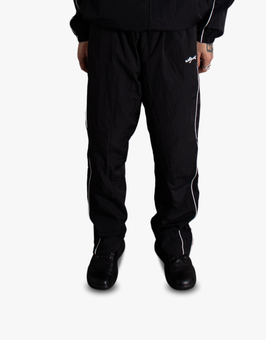 PANTALONES DE NYLON [NEGRO]