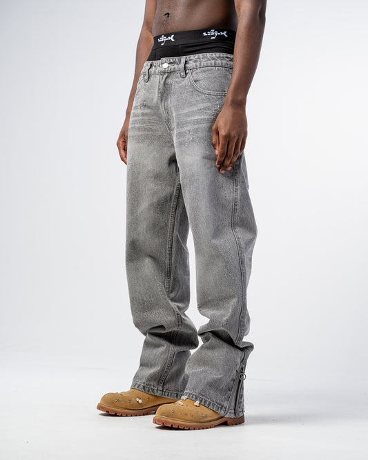 JEANS FLARE FIT CON CREMALLERA [GRIS]