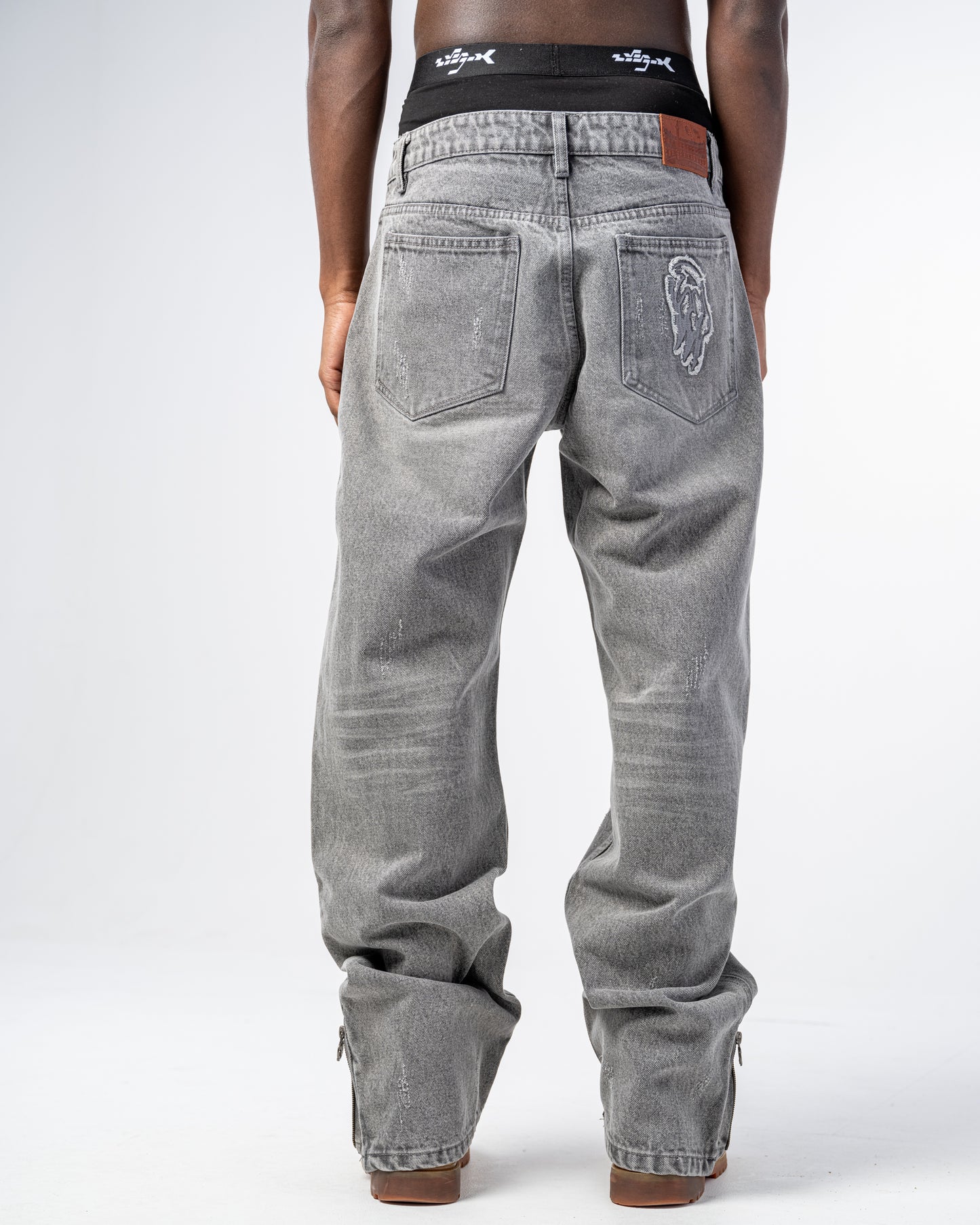 JEANS FLARE FIT CON ZIP [GRIGIO]